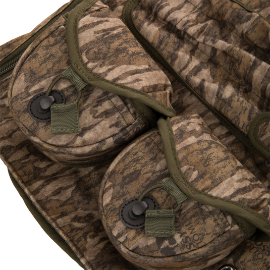 Time & Motion™ Gunslinger Turkey Vest close-up, highlighting its well-organized straps and pockets designed for efficient access to hunting gear and calls.