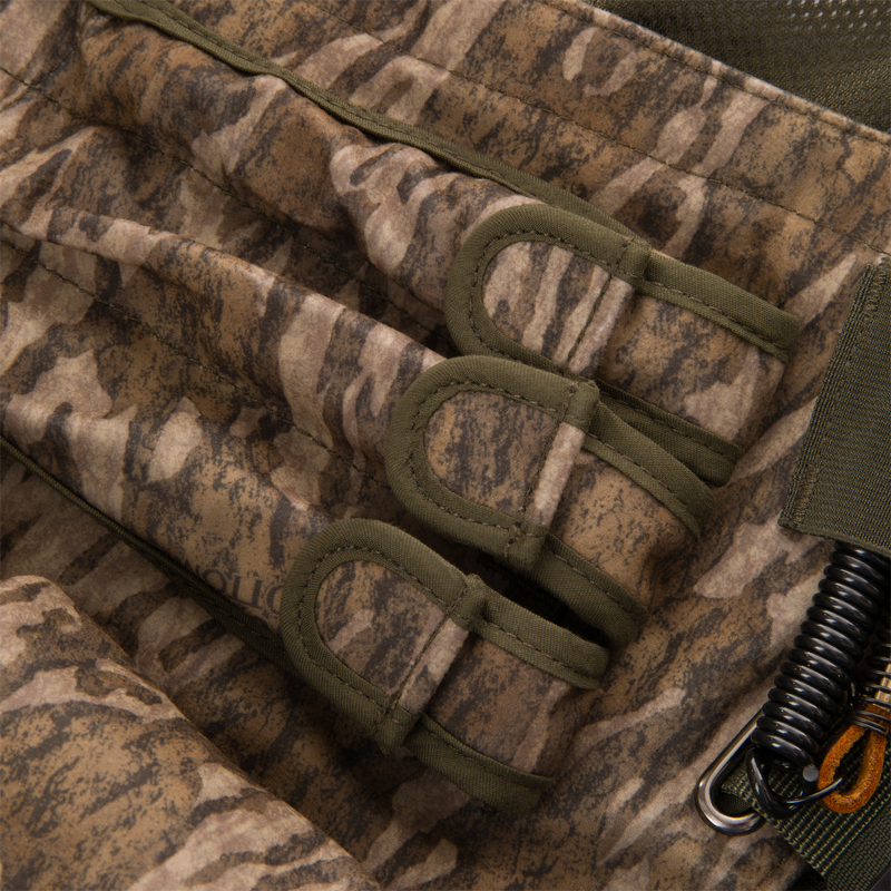 Time & Motion™ Gunslinger Turkey Vest close-up showing textile detail and organized pockets for hunting gear, highlighting weight distribution and intuitive access features.