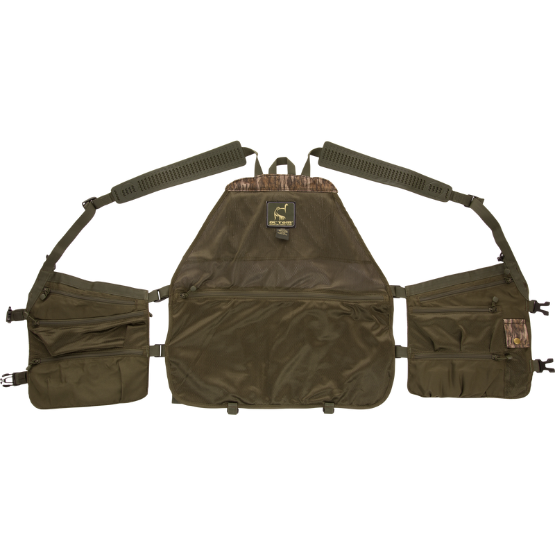 Time & Motion™ Gunslinger Turkey Vest close-up, showcasing organized call pockets and adjustable rubber straps, designed for efficient gear access during hunting.