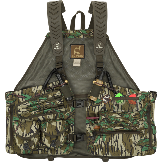 Time & Motion™ Gunslinger Turkey Vest with a camouflage pattern, featuring multiple organized pockets and adjustable straps, designed for efficient gear access and comfort during hunting.