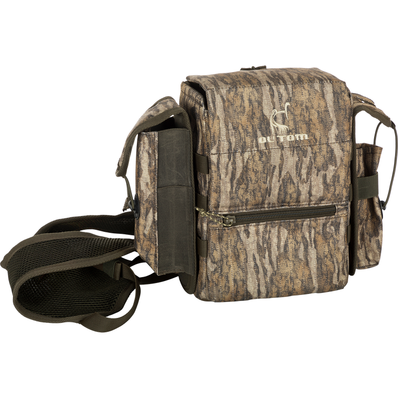 Turkey Chest Pack with strap, zipper, and detachable bino harness, ideal for hunting trips with multiple pockets and a stowable rain fly.