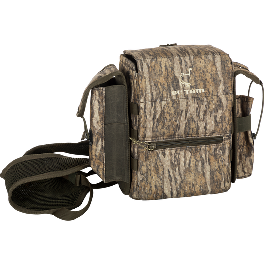 Turkey Chest Pack with strap, zipper, and detachable bino harness, ideal for hunting trips with multiple pockets and a stowable rain fly.