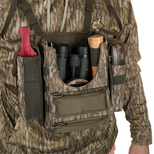 Turkey Chest Pack with integrated bino harness, multiple pockets, and a stowable rain fly, ideal for hunting adventures.