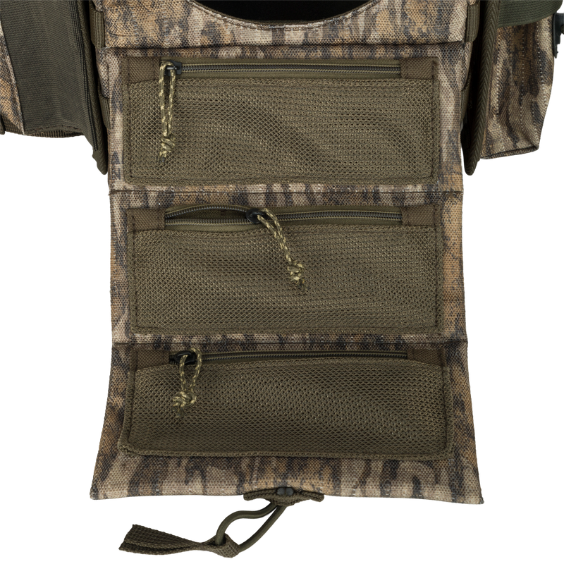 Turkey Chest Pack with multiple zippered pockets, detachable bino harness, and stowable rain fly, designed for lightweight hunting trips and gear organization.