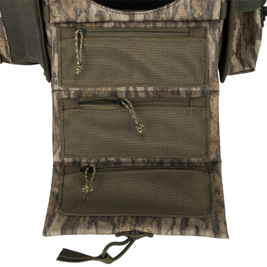 Turkey Chest Pack with multiple zippered pockets, detachable bino harness, and stowable rain fly, designed for lightweight hunting trips and gear organization.