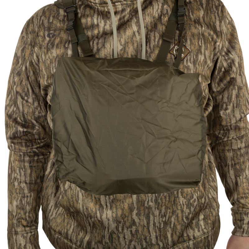 Turkey Chest Pack displayed on a person, showcasing its rain cover.