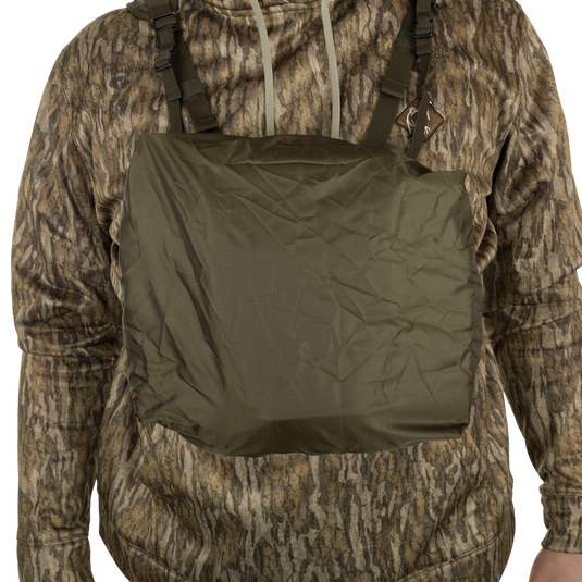 Turkey Chest Pack displayed on a person, showcasing its rain cover.