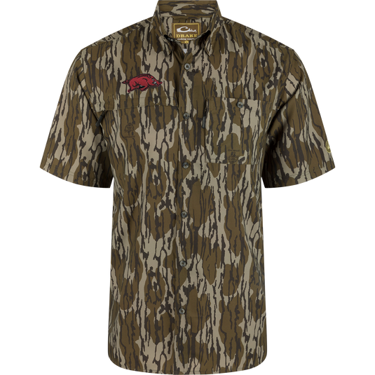 Arkansas 8-Shot Short Sleeve Shirt in camouflage, featuring chest pockets, razorback hog patch, and vented cape back, designed for moisture wicking and sun protection.