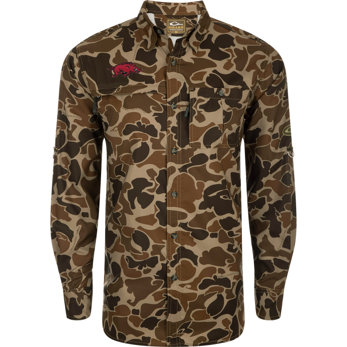 Arkansas 8-Shot Long Sleeve Shirt with camouflage pattern, two chest pockets, embroidered logo, roll-up sleeves, vented cape back, and split tail hem.