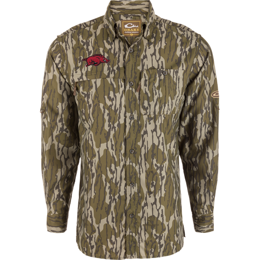 Arkansas 8-Shot Long Sleeve Shirt in bark camo with Razorback logo, features moisture-wicking Dobby fabric, hidden zipper pockets, and UPF 30 sun protection.