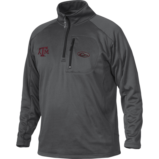A grey jacket with Texas A&M logo embroidery on the right chest, perfect for active outdoorsmen. Made of 100% polyester with 4-way stretch and square check fleece backing for comfort and breathability. Features a vertical front chest zippered pocket.