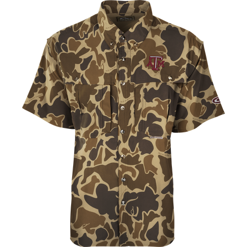 Texas A&M S/S Flyweight Wingshooter shirt features a camouflage pattern, vented back design, and logo, ideal for warm-weather outdoor activities.