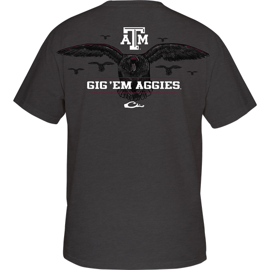 Texas A&M Cupped Up T-Shirt: Back artwork of a stylized duck scene with other ducks in the background, featuring your school's logo and catchphrase. Front left chest displays the Drake logo in your school's color.