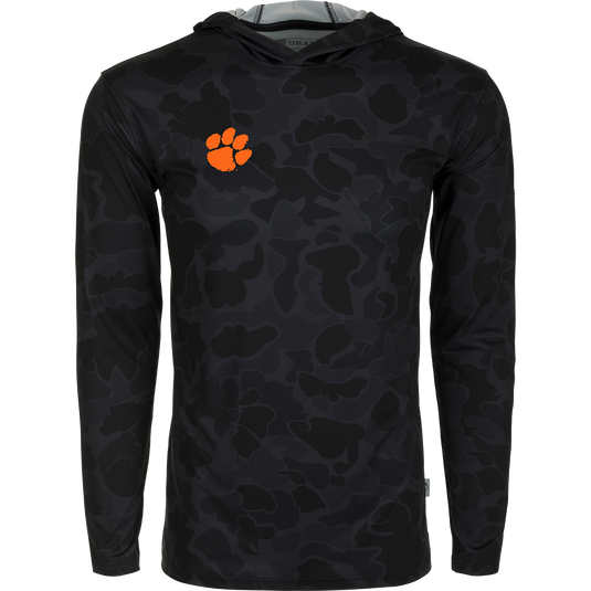 Clemson Performance Long Sleeve Camo Hoodie - A versatile black hoodie with an orange paw print, delivering exceptional functionality with cooling, stretch, and moisture-wicking features. Perfect for all-year wear in various weather conditions.