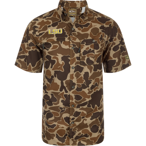 LSU 8-Shot Short Sleeve Shirt with camo print, embroidered LSU, two pockets, and Drake Clothing Co. logo, designed for comfort and functionality in outdoor settings.