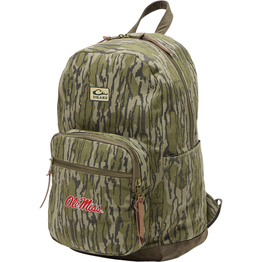 Ole Miss Throwback 80 Backpack featuring camo print, large zippered compartment, suede-style bottom, Ole Miss embroidered front pocket, and durable canvas for rugged use.