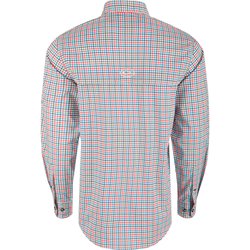 A classic fit, long sleeve shirt with a checkered pattern, hidden button-down collar, and two chest pockets. Made from lightweight, moisture-wicking fabric with UPF30 sun protection. Perfect for hunting and outdoor activities. From the Purewhitelaneshop store.