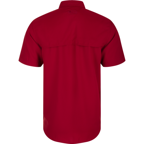 South Carolina Frat Dobby Solid Short Sleeve Shirt, a performance shirt with built-in stretch, UPF 30 sun protection, and moisture-wicking capabilities. Classic fit with hidden button-down collar and vented cape back.