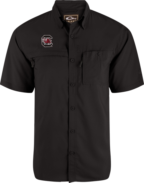 South Carolina 8-Shot Short Sleeve Shirt with chest pockets, Gamecocks logo, and vented cape back, designed for outdoor enthusiasts with moisture-wicking, sun protection, and stretch fabric.