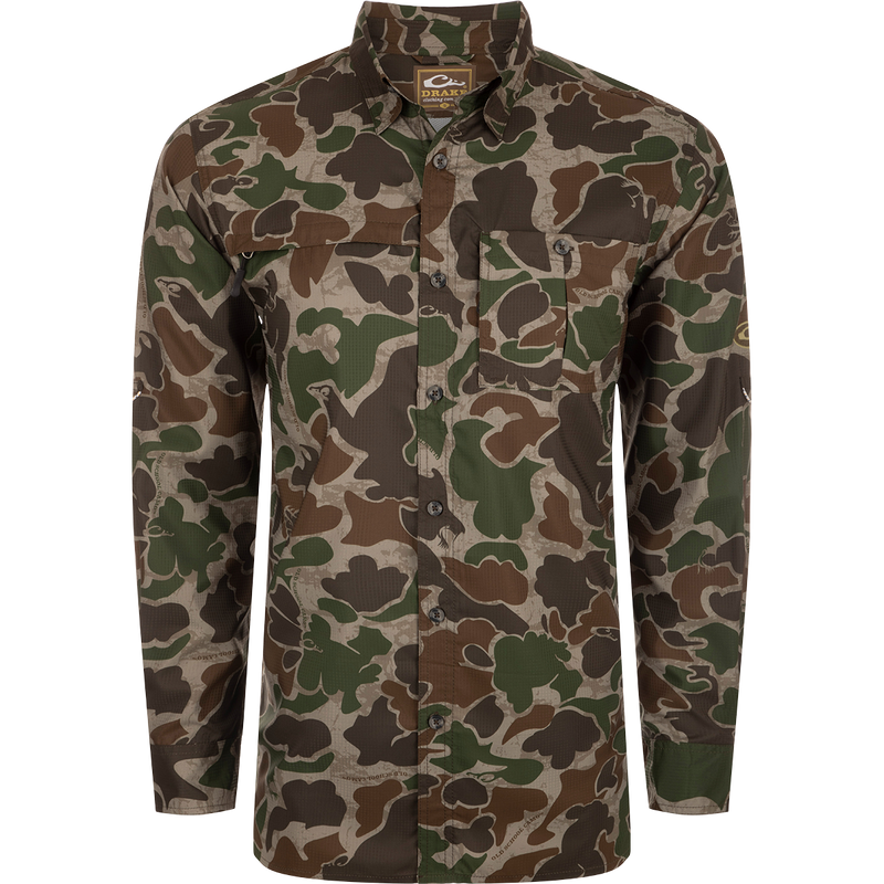 A close-up of the Drake 8-Shot Flyweight L/S Shirt, featuring the exclusive Old School Camo pattern. Made from 100% Polyester Dobby fabric, it offers UPF30 sun protection, moisture-wicking, and quick-drying properties. 