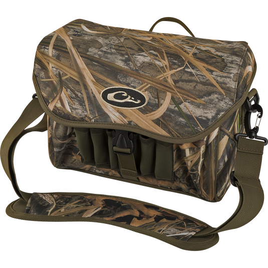 Refuge Blind Bag by Purewhitelaneshop: Camouflage bag with adjustable strap, logo detail, and durable hardware. Ideal for daily waterfowl hunting with improved zipper, outer pocket, and neoprene shell loops.