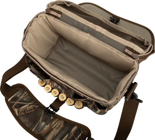 A rugged Refuge Blind Bag by Purewhitelaneshop, ideal for daily waterfowl hunting. Features adjustable strap, improved zipper, durable hardware, outer pocket, and neoprene shell loops. Dimensions: 12 W x 8 H x 6 D.