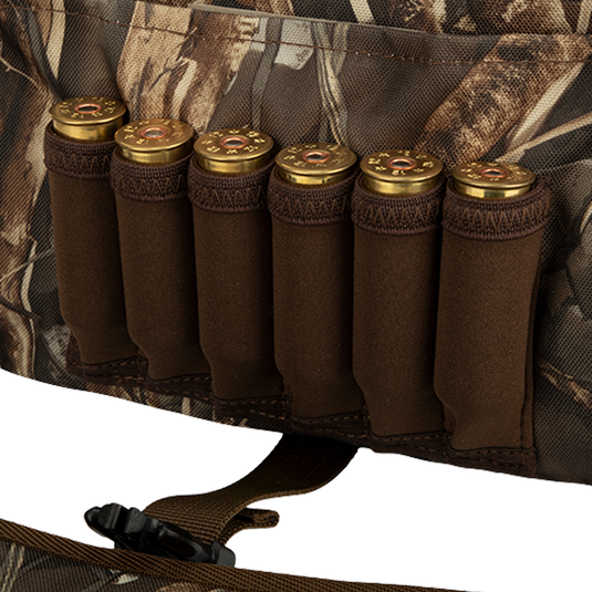 A rugged Refuge Blind Bag by Purewhitelaneshop, ideal for waterfowl hunters needing essential gear without excess weight. Features adjustable strap, durable hardware, neoprene shell loops, and waterproof liner.
