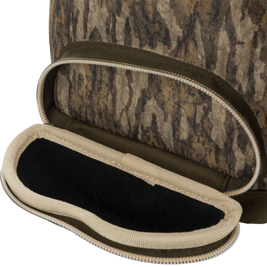 Large Blind Bag with 18 pockets for organizing gear. Waterproof, durable construction with adjustable shoulder strap. Ideal for hunting and fishing.