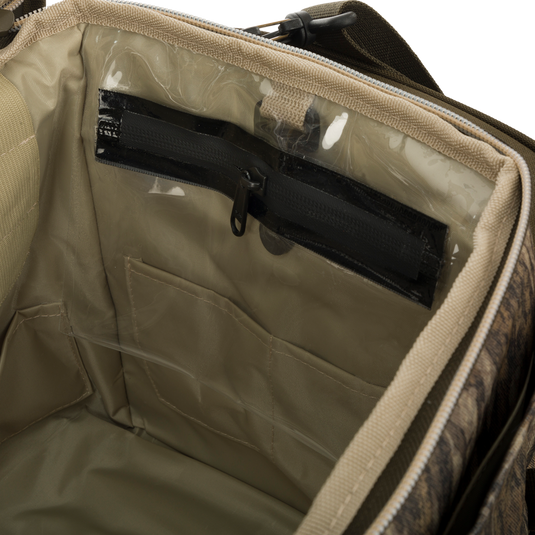 Large Blind Bag with zipper, 18 pockets for organizing gear, waterproof internal compartment, durable construction, adjustable shoulder strap.