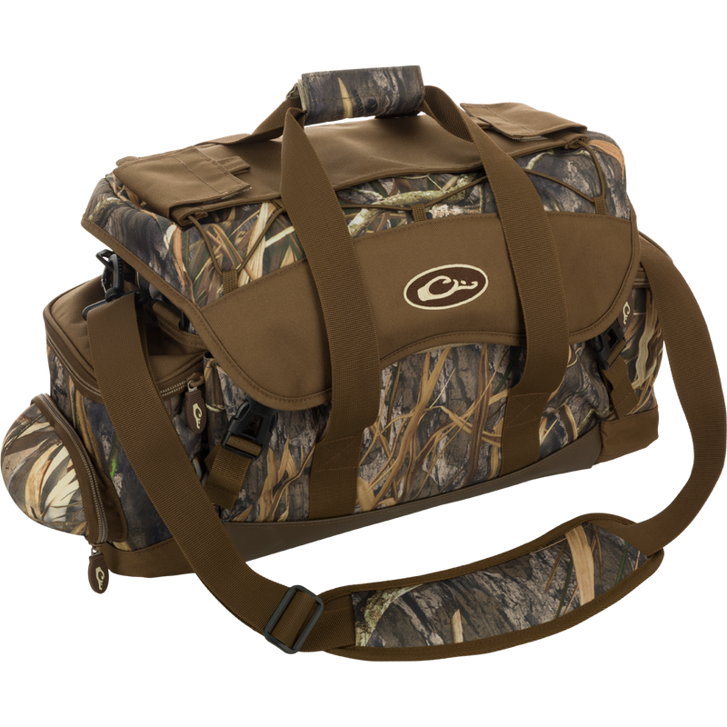 A large blind bag with camouflage pattern and multiple pockets for organizing gear. Waterproof construction with durable materials for long-lasting use. Adjustable straps for comfortable carrying. Dimensions: 18