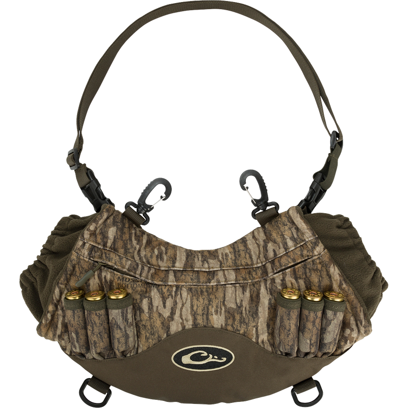 Alt text: Drake LST Handwarmer Muff with shell loops, front storage pocket, clear waterproof phone pouch, and clips for attaching to wader D-rings.