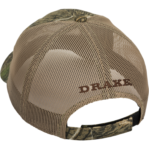 A 6-panel camo mesh-back cap made from 100% cotton. Features low-profile construction, lightly structured front panels, and a hook & loop back closure for a secure fit. The Drake 