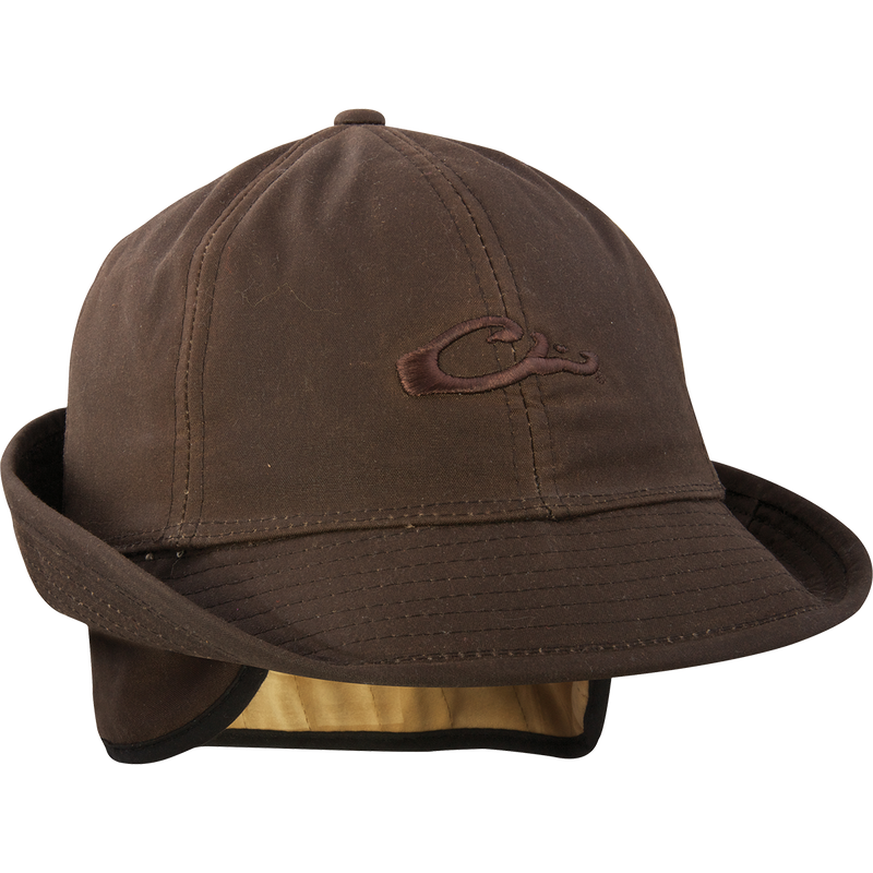 A brown Wax Canvas Jones Hat with a logo, fold-down ear flaps, and 2