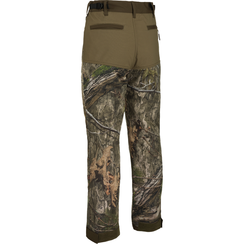 A pair of Standstill Windproof Pants with Agion Active XL®, perfect for late-season hunts. Soft, quiet, and durable fabric protects against cold and winds. Features scent control technology, adjustable waist, cuffs, and multiple pockets.