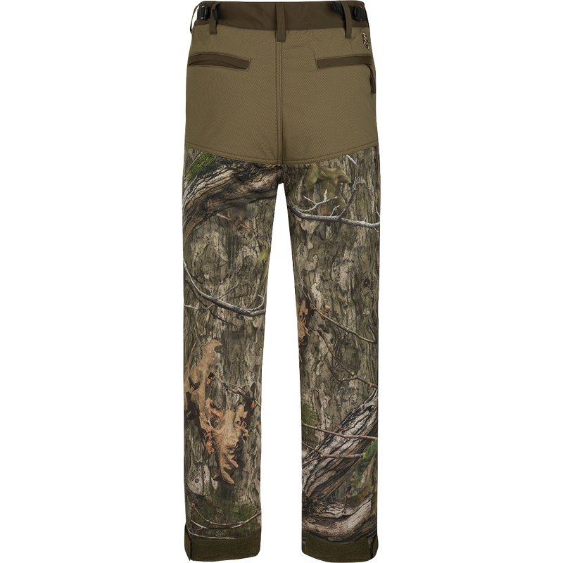 A pair of Standstill Windproof Pants with Agion Active XL®, perfect for late-season hunts. Soft, quiet, and durable, these pants are your best weapon against the cold and winds. Features adjustable waist and cuffs, front slash pockets, cargo pockets, and rear pockets.