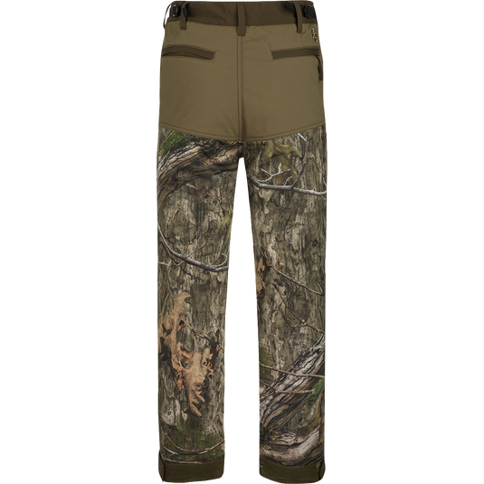 A pair of Standstill Windproof Pants with Agion Active XL®, perfect for late-season hunts. Soft, quiet, and durable, these pants are your best weapon against the cold and winds. Features adjustable waist and cuffs, front slash pockets, cargo pockets, and rear pockets.