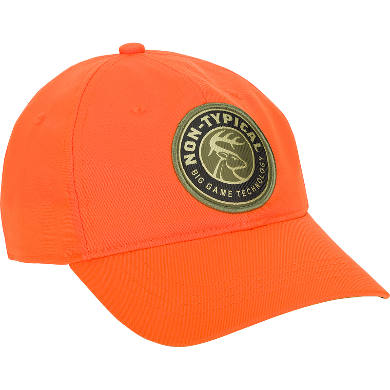 A close-up of the Big Game Technology Patch Camo Twill Cap, a lightweight cotton/polyester cap with camo concealment under the bill. Six-panel construction with adjustable snap closure.