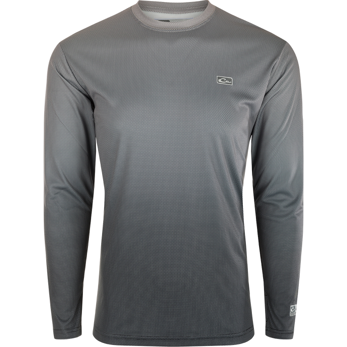 Performance Ombre Dot Long Sleeve Crew, a highly efficient garment with Built-In Cooling, UPF 50, Moisture Wicking, and Quick Drying technologies. Lightweight and breathable, perfect for water and beach activities. Final Sale.