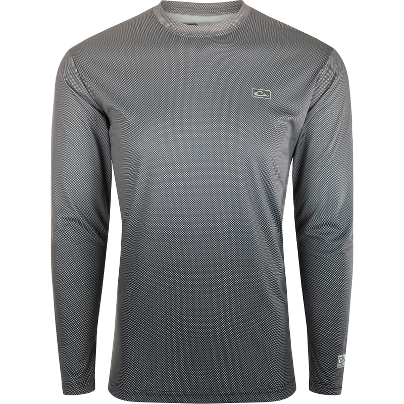 Performance Ombre Dot Long Sleeve Crew, a highly efficient garment with Built-In Cooling, UPF 50, Moisture Wicking, and Quick Drying technologies. Lightweight and breathable, perfect for water and beach activities. Final Sale.