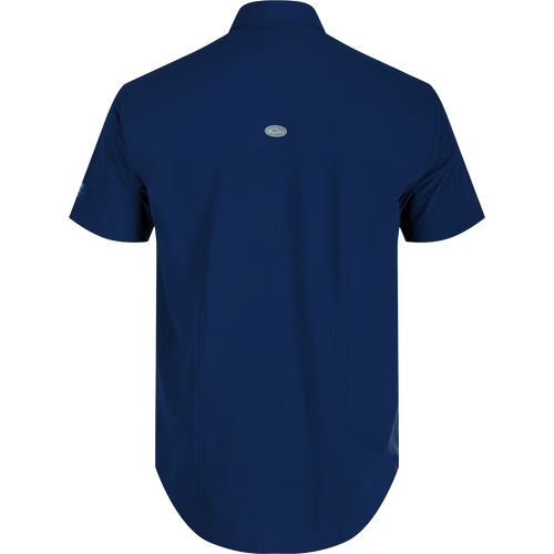 A close-up of the Performance Mesh Paneled Short Sleeve Shirt with laser-punched mesh back panels for ventilation and two button-through chest pockets. Lightweight, moisture-wicking fabric with UPF 50 sun protection. Perfect for outdoor activities.