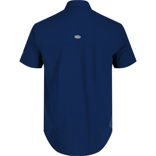A close-up of the Performance Mesh Paneled Short Sleeve Shirt with laser-punched mesh back panels for ventilation and two button-through chest pockets. Lightweight, moisture-wicking fabric with UPF 50 sun protection. Perfect for outdoor activities.