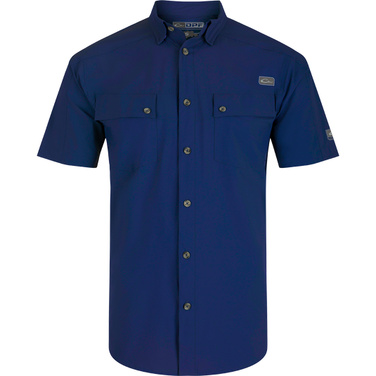Performance Mesh Paneled Short Sleeve Shirt with laser-punched mesh back panels for ventilation, hidden button-down collar, and two chest pockets.