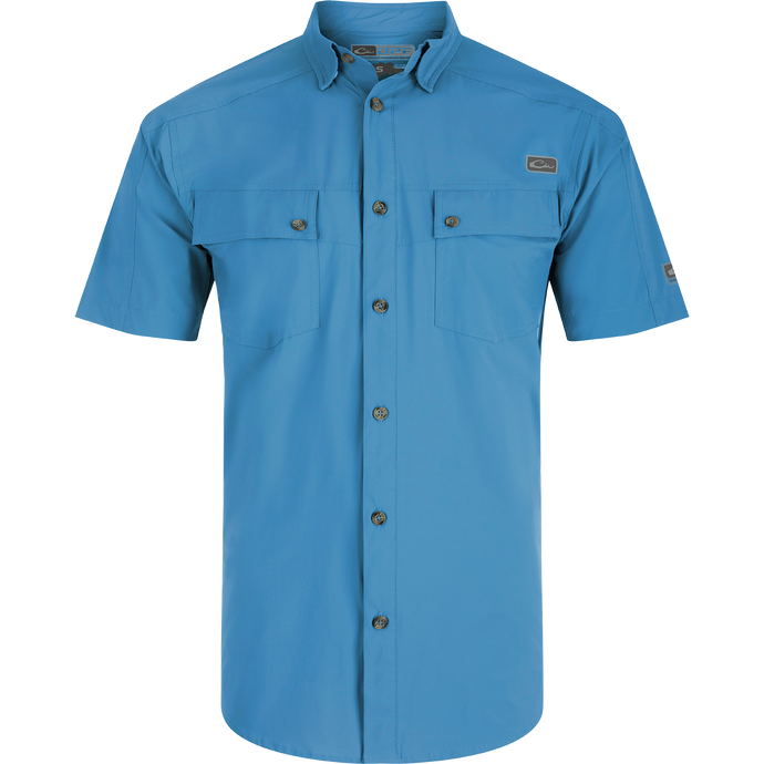 A Performance Mesh Paneled Short Sleeve Shirt with laser-punched mesh for ventilation, hidden button-down collar, and two chest pockets. Lightweight, moisture-wicking, and UPF 50 sun protection.
