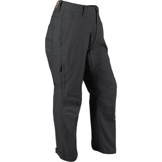 Grey Canvas Waterfowler's Pant: Lightweight cotton canvas pant for under-wader or casual wear. Garment-washed for softness. Features include ankle cuffs, rear pockets, side storage pocket, and zippered fly.