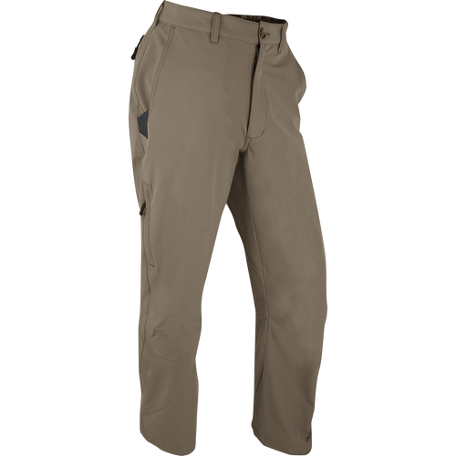 A pair of Stretch Tech Pants with 4-way stretch, moisture-wicking, and gusseted crotch for ease of movement. Features YKK zippers, side stash pockets, and cargo pockets.