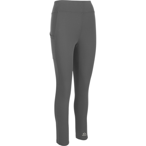 Women's Commando Solid Legging, a versatile high-performance legging with 4-way stretch fabric, a 4-inch waistband, and side stash pockets. Quick-drying and moisture-wicking for your next adventure.
