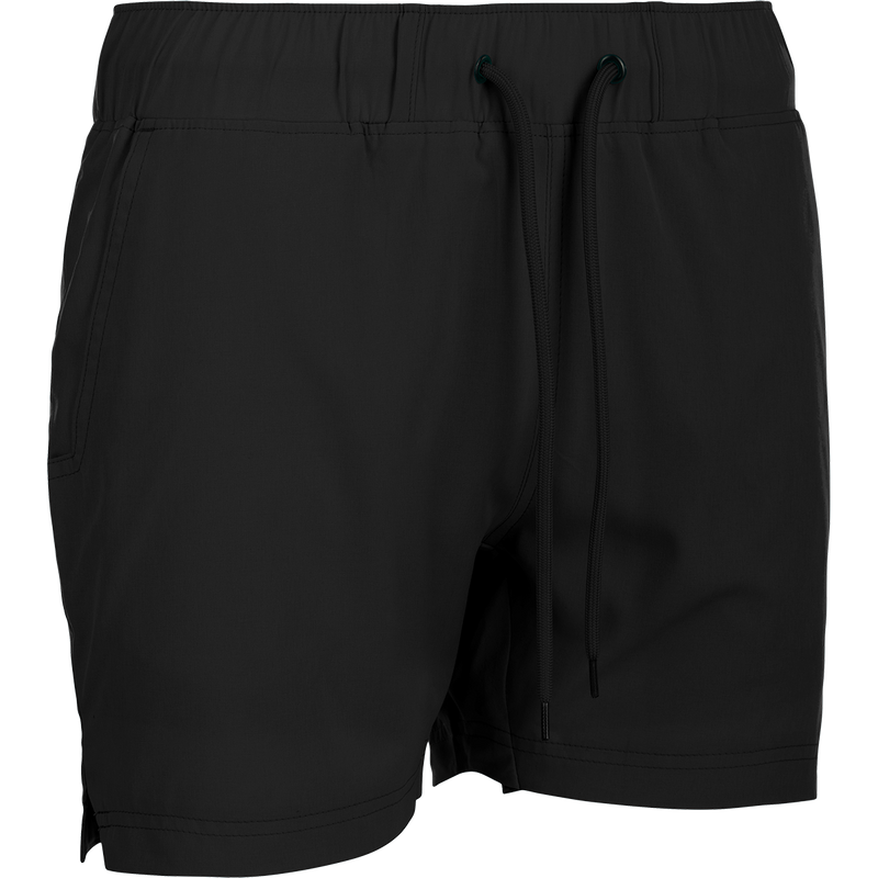 A versatile black shorts with drawstring and built-in liner, ideal for the gym or beach. Made with 88% polyester and 12% spandex for 4-way stretch. Quick-drying, moisture-wicking, and water-resistant. Features scalloped hem, front/back mesh pockets, and elastic waist with adjustable drawstring. From Purewhitelaneshop's Women's Commando Lined Short 4.5