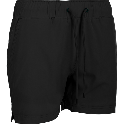 A versatile black shorts with drawstring and built-in liner, ideal for the gym or beach. Made with 88% polyester and 12% spandex for 4-way stretch. Quick-drying, moisture-wicking, and water-resistant. Features scalloped hem, front/back mesh pockets, and elastic waist with adjustable drawstring. From Purewhitelaneshop's Women's Commando Lined Short 4.5