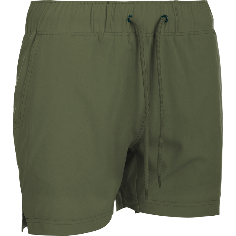 A versatile pair of green shorts with a built-in liner. Made with 88% polyester and 12% spandex for 4-way stretch. Features include front slash pockets, back pockets with closures, and a 4.5