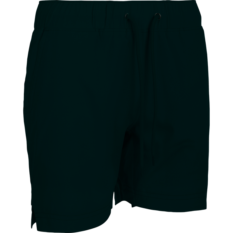 A versatile black shorts with a drawstring and built-in liner, perfect for the gym or beach. Features include 4-way stretch, quick-drying fabric, and moisture-wicking technology. Back and front pockets, scalloped hem, and a 7-inch inseam. From Purewhitelaneshop.